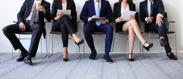 Candidates waiting for an interview at a recruitment agency