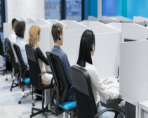 A group of employees working in a call center.