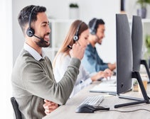 A team of workers using a VoIP system