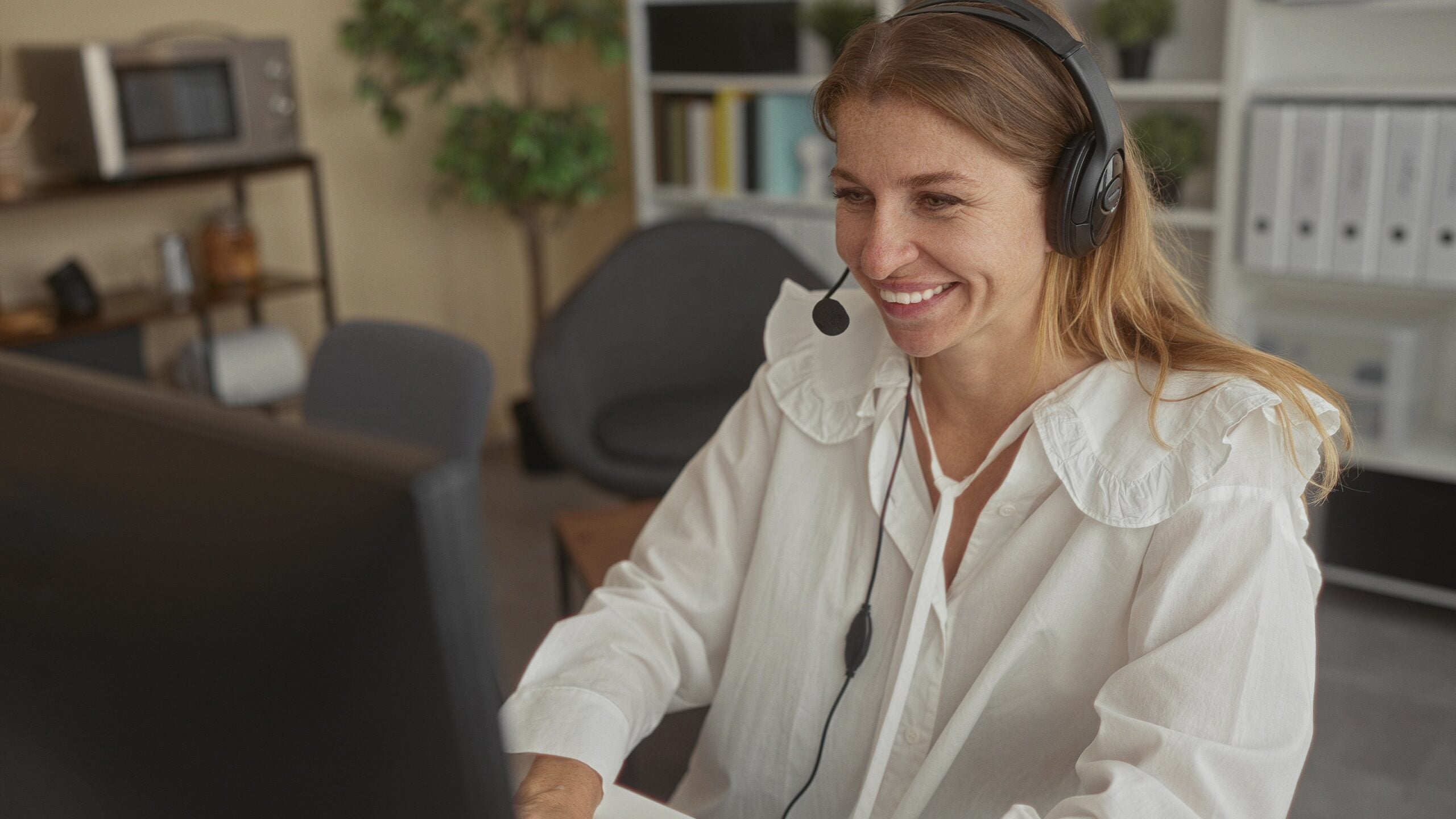 woman on an office phone headset