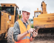 Man using asset tracking on a construction site
