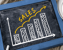 Drawing of increasing sales on a chalkboard