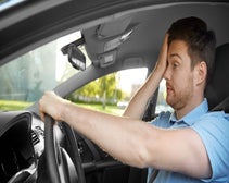 tired driver in a vehicle fatigued