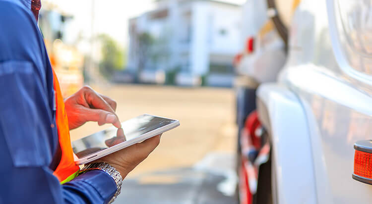 Driver conducting an electronic driver vehicle inspection report