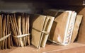 Stack of old letters on a wooden bookcase