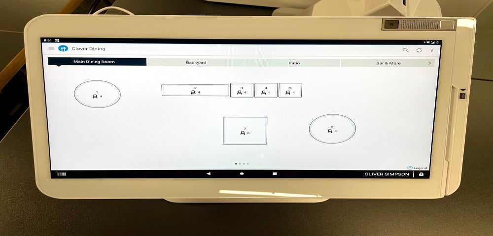 Clover POS terminal with screen set to table plan