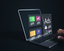 Businessman using laptop with Ads dashboard digital marketing strategy analysis for branding.