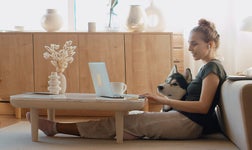 Woman telecommuting from home