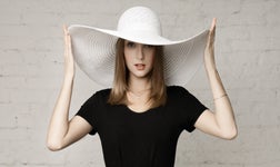 Woman wearing white hat SEO