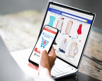 laptop and phone depicting ecommerce web shop