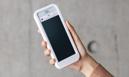 Dojo Pocket card machine in a person's hand