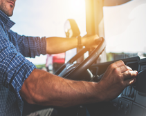 driver hand adjusting vehicle settings