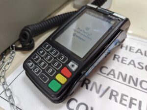 barclaycard reader on a desk