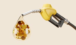 A gas pump with money coming out of it.