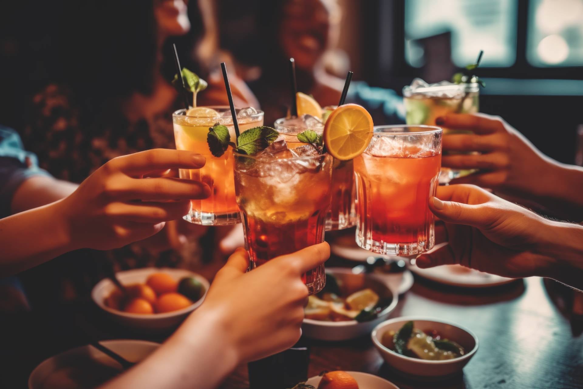 Close up of friends group cheering mojito drinks at bar restaurant. Generative AI.